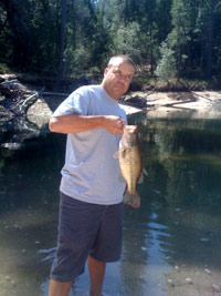 Man with Catch of the Day at Bass Lake