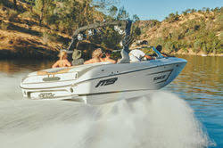 Family Hauling in Wake Boat on the Lake * Bass Lake Boat Rentals